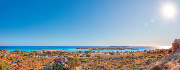 Tropical sandy beach with turquoise water, in Elafonisi, Crete, Greece. Elafonissi beach with pink sand. Copy space.