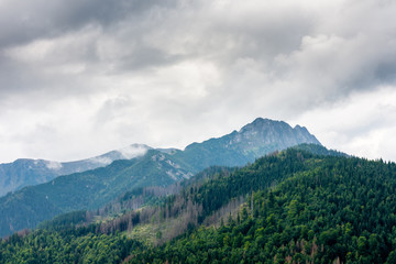 Fototapeta premium Dark clouds over the mountains