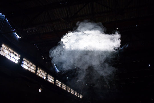 smoke bomb cloud in deserted empty hangar © aerogondo