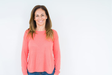 Beautiful middle age woman over isolated background with a happy and cool smile on face. Lucky person.