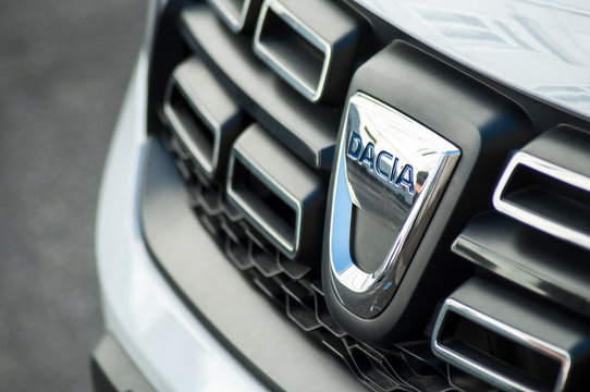 Mulhouse - France - 18 August 2019 - Closeup of logo on grey Dacia front parked in the street