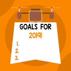 Writing note showing Goals For 2019. Business concept for object of demonstratings ambition or effort aim or desired result Drone holding downwards banner. Geometrical abstract background design