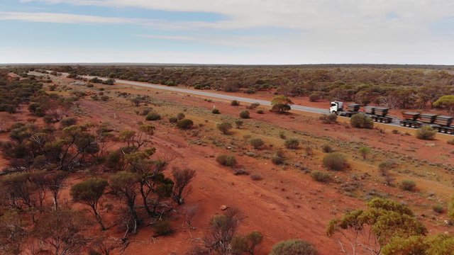 Aerial view of Road Train traveling the Australian Outback (Large Truck)