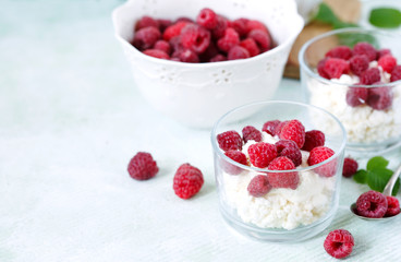 Cottage cheese with fresh raspberry for healthy breakfast