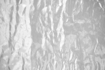 Shiny silver leaf foil texture background
