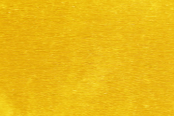 Obraz premium Shiny yellow leaf gold foil texture background