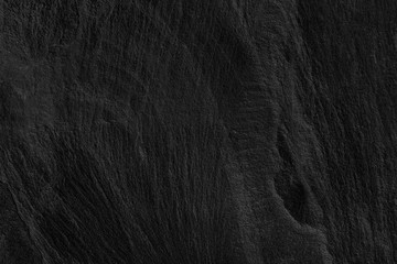Dark grey black slate background or texture.