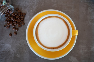 cup of coffee on wooden table