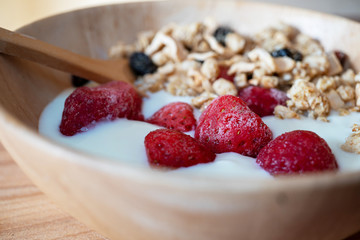 Healthy bowl with stawberry in the yogurt 