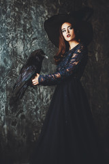 Fototapeta premium elegant witch with raven