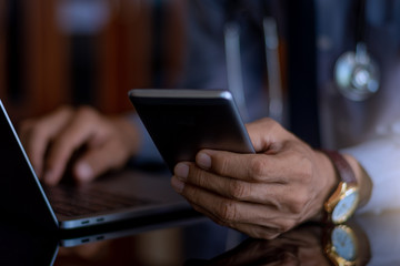 man using digital tablet