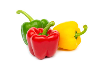 Green Yellow and Red peppers Three types isolated on white background