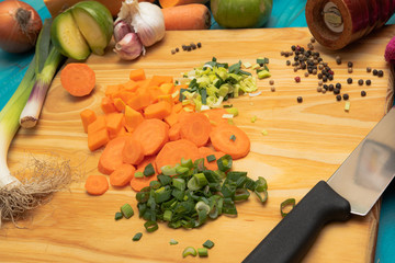  cut vegetables, pepper and board