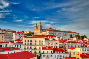 Scenic Alfama lookout with San Vicente (Saint Vincent) statue and Sao Vicente de Fora a church on the background