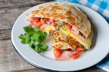 Mexican quesadillas with sliced ham also called 