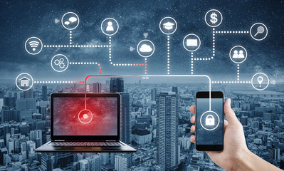 Internet and online data security system. Laptop computer hacking, and stealing data from mobile smart phone 