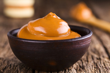Latin American sweet caramel-like Manjar or Dulce de leche used as spread or filling in baking,...