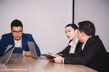 Business people  in seminar room. Meeting Corporate Success Brainstorming Teamwork