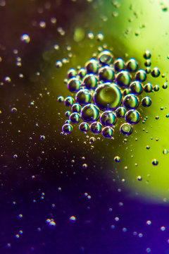 oil bubbles on a water surface with colorful abstract background