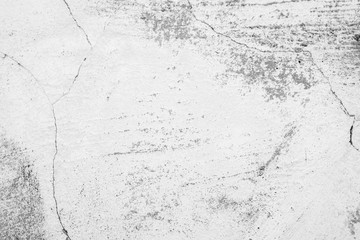 Texture of a concrete wall with cracks and scratches which can be used as a background