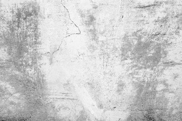 Texture of a concrete wall with cracks and scratches which can be used as a background