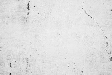 Texture of a concrete wall with cracks and scratches which can be used as a background