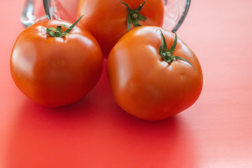 Beefsteal tomatoes with blender in kitchen