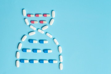Studio shot of medical pills on blue background