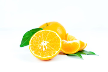 Orange fruits with leaf on isolated white background.