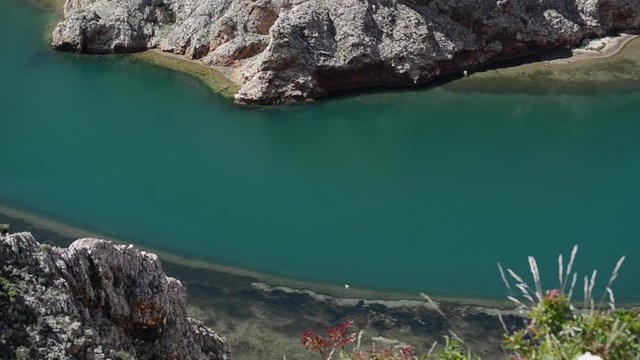 Zrmanja river canyon. Green river with crystal clear water in canyon.  Film location for Winnetou western movies. The river Zrmanja   gorge. Beautiful Landscape in Croatia, Europe.
