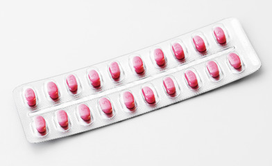 Tablet blister with pink pills