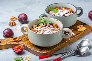 Crumble of red cherry plum, oatmeal and walnut.