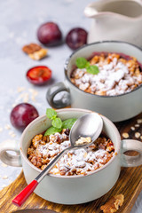 Delicious crumble of red cherry plum and oatmeal.
