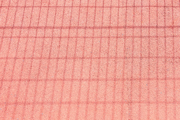 Sport court without people with bright sun and dense shadows