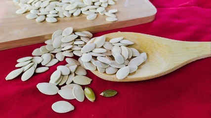 seeds pumpkin on red  background