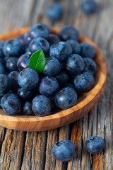 fresh blueberries in a wooden bowl