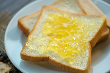 Closeup pineapple jam on bread