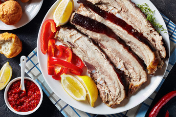 slices of roast pork belly on a plate