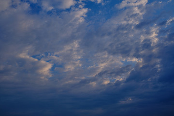 Clouds on the blue sky.