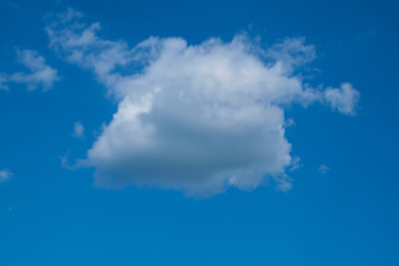 Clouds on the blue sky.