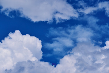 Clouds on the blue sky.
