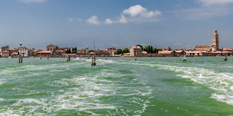 Foam trail from the boat in the Venetian lagoon