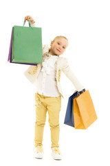 Little girl with multi-colored bags in their hands.