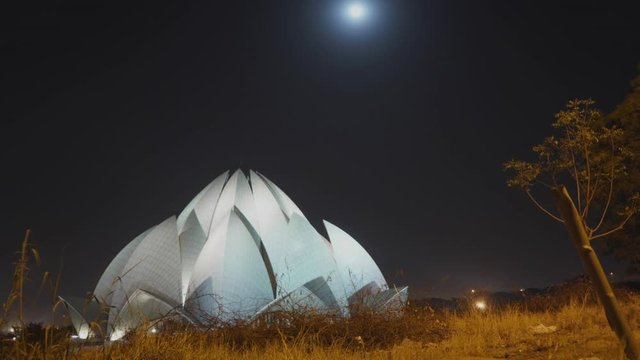 Rare night shot of the Lotus Temple from rear viewpoint, seemingly lit by the moon