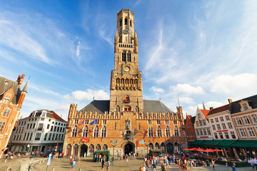 The Belfry Tower, aka Belfort, of Bruges, medieval bell tower in the historical centre of Bruges, Belgium. - obrazy, fototapety, plakaty