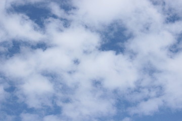 Beautiful clouds floating on the vast blue of the sky