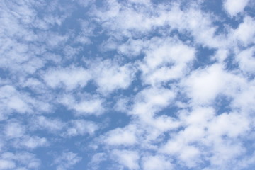 Beautiful clouds floating on the vast blue of the sky