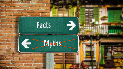 Fototapeta na wymiar Street Sign to Facts versus Myths
