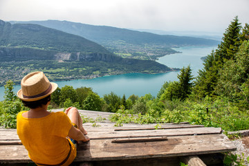 woman looking at the landscape of Lake Annecy