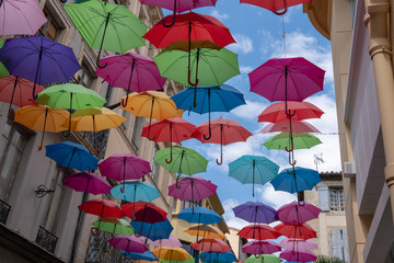 Fototapeta na wymiar Lots of colorful umbrellas in sky city decoration